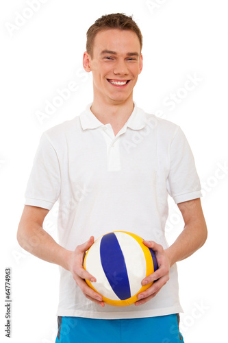 portrait of happy young man playing with beach ball 