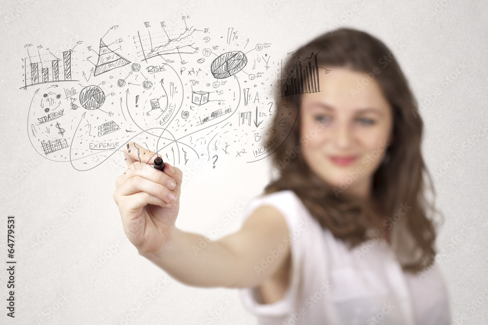 Pretty girl sketching graphs and diagrams on wall Pretty girl sketching graphs and diagrams on wall