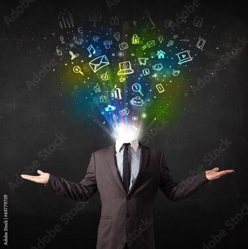 Business man with glowing media icons exploding head