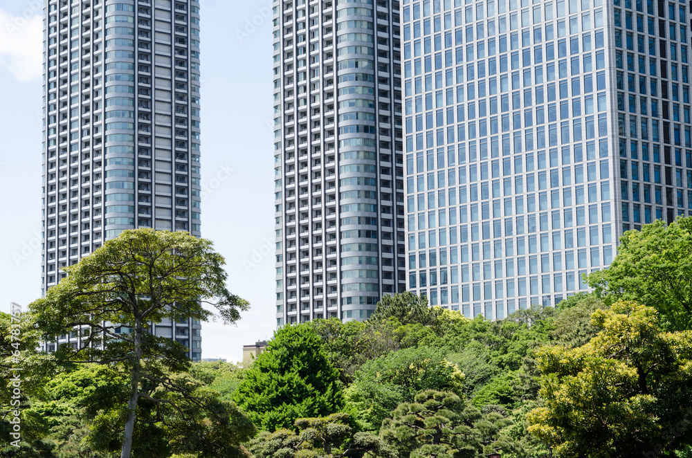 Skyscrapers and japanese garden in Tokyo Japan