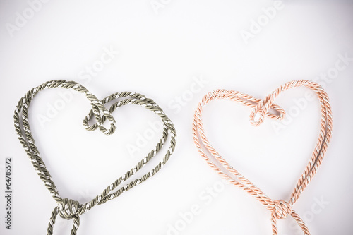 orange and green rope in heart shape with vignette