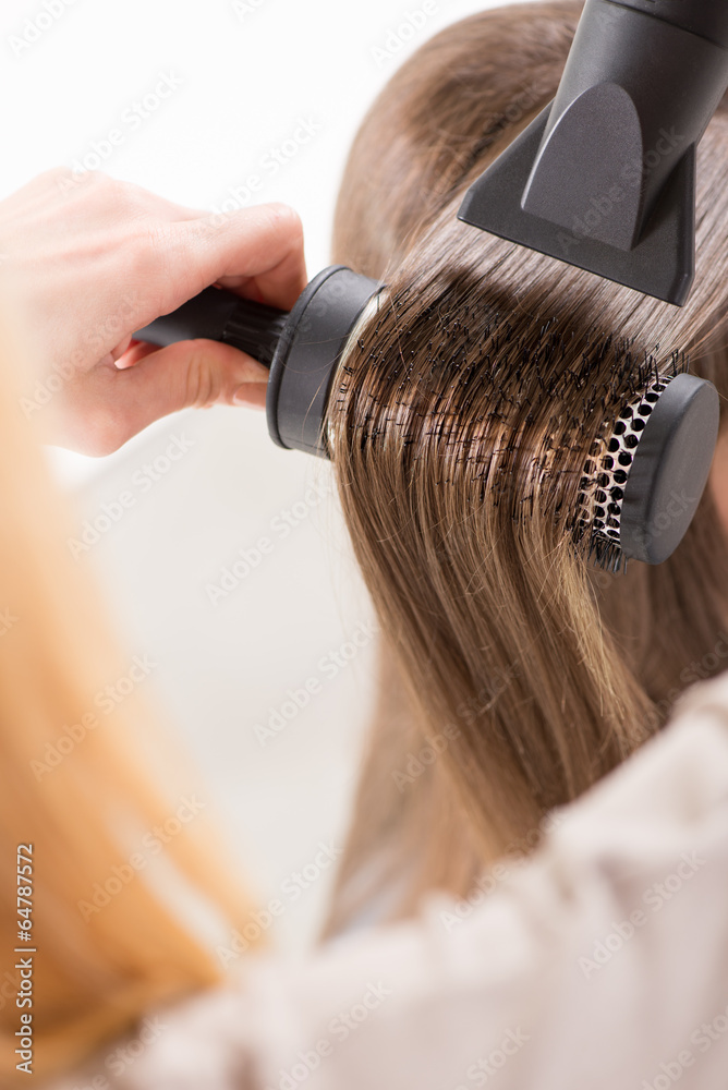 Naklejka premium Hair drying.