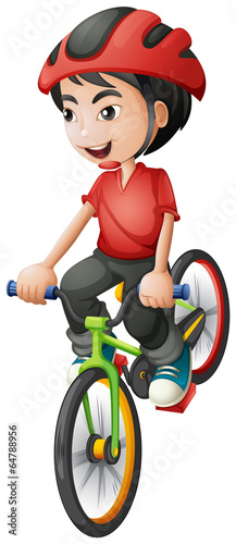 A boy riding his bike
