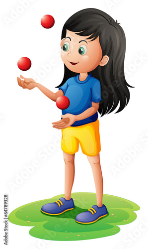 A girl juggling
