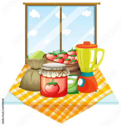 A table with foods near the window