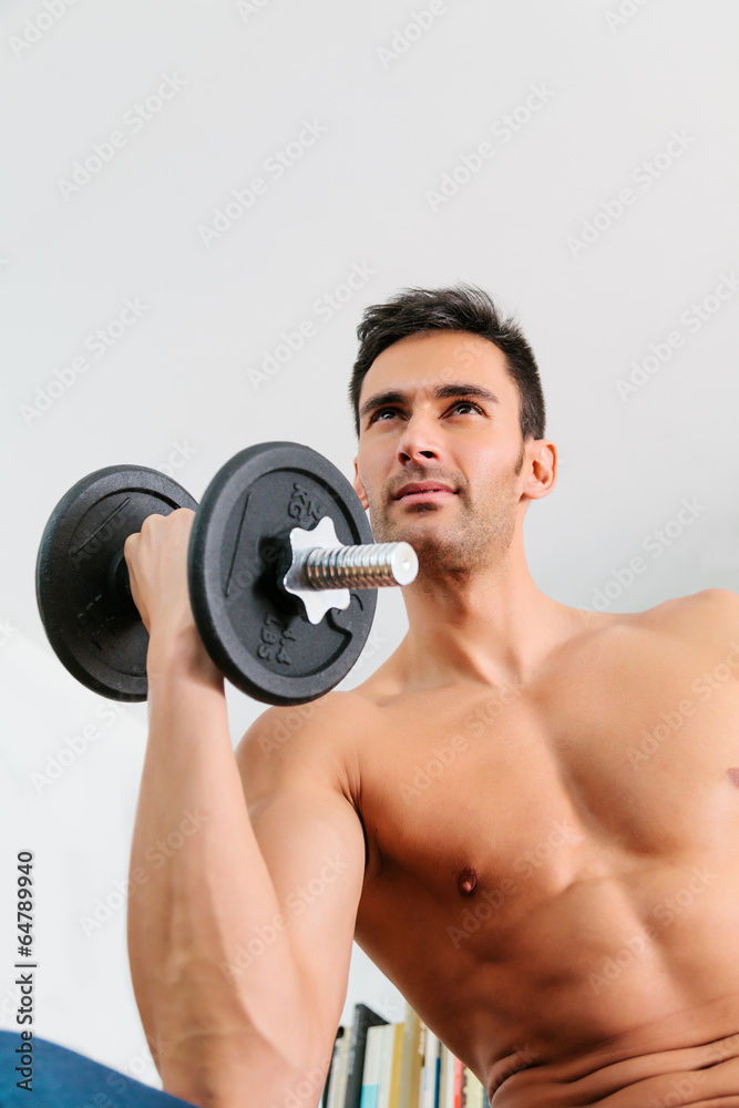 Young Man Doing Weights Young Man Doing Weights