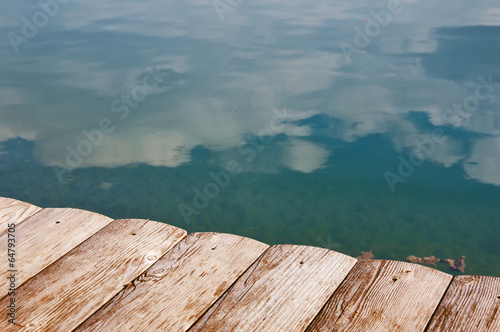 wooden bridge over the lake