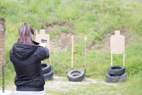 Girl Practicing at the Shooting Range