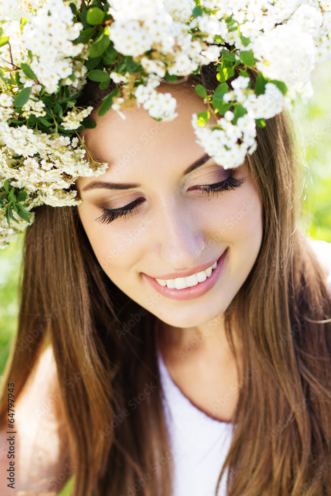 Beautiful girl on the nature in wreath of flowers Beautiful girl on the nature in wreath of flowers