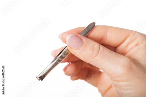 Foto Hand with tweezers
