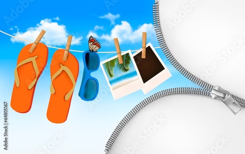 Flip flops, sunglasses and photo cards hanging on a rope. Summer