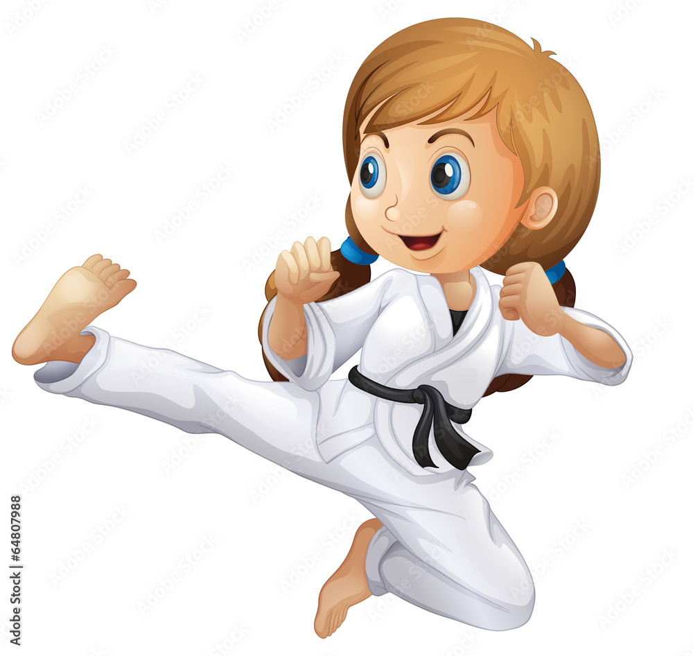 A young girl doing karate