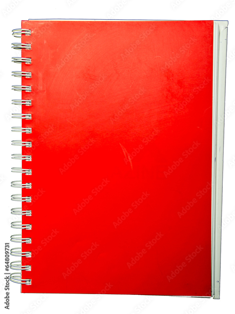 Red notebook spiral bound on white background Red notebook spiral bound on white background