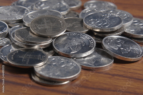 coin rupiah at wooden table