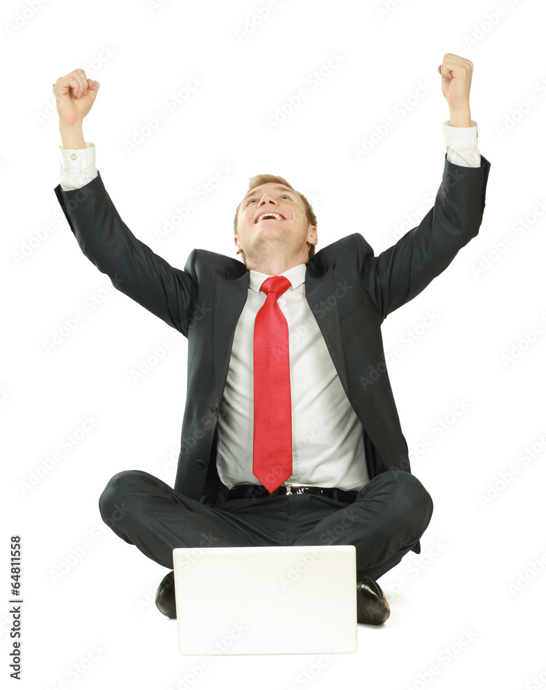 Portrait of a happy young businessman working on laptop Portrait of a happy young businessman working on laptop