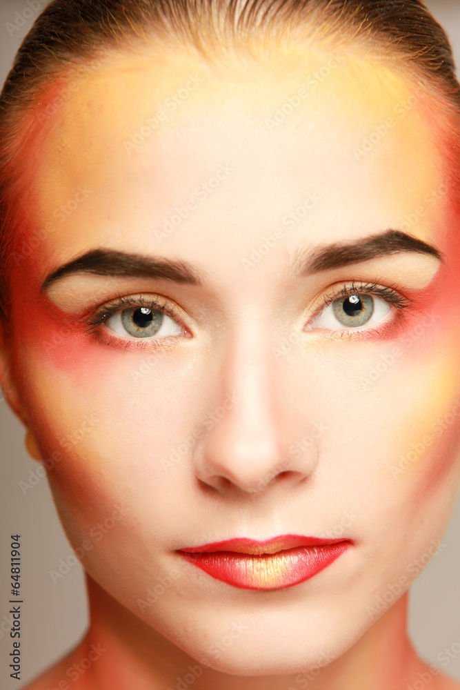 beautiful make up of bright lips, isolated on grey background beautiful make up of bright lips, isolated on grey background