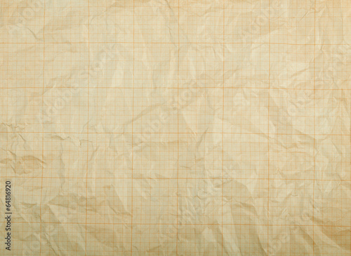 Old vintage discolored dirty graph paper.