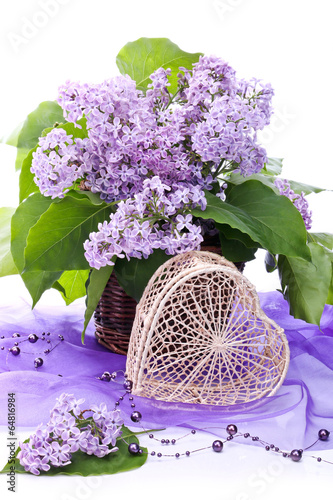 Decorating with a bouquet of lilac and heart