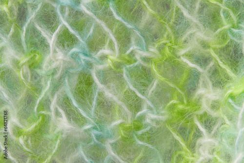 woolen texture background, knitted wool fabric, green fluffy