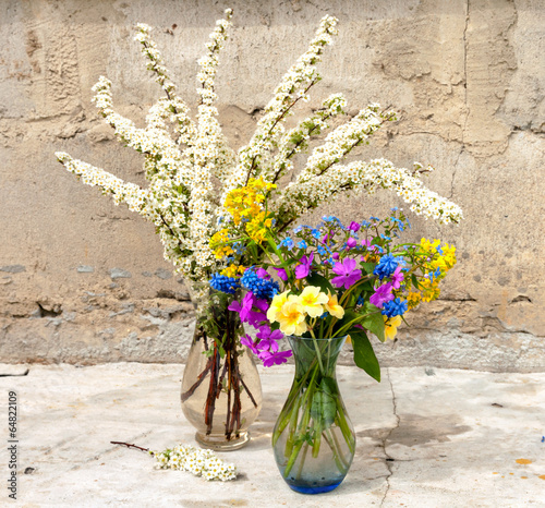 still life bouquetes with spring flowers photo