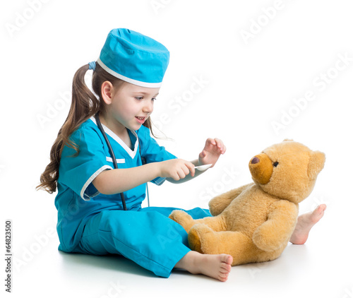 kid girl playing doctor wit...