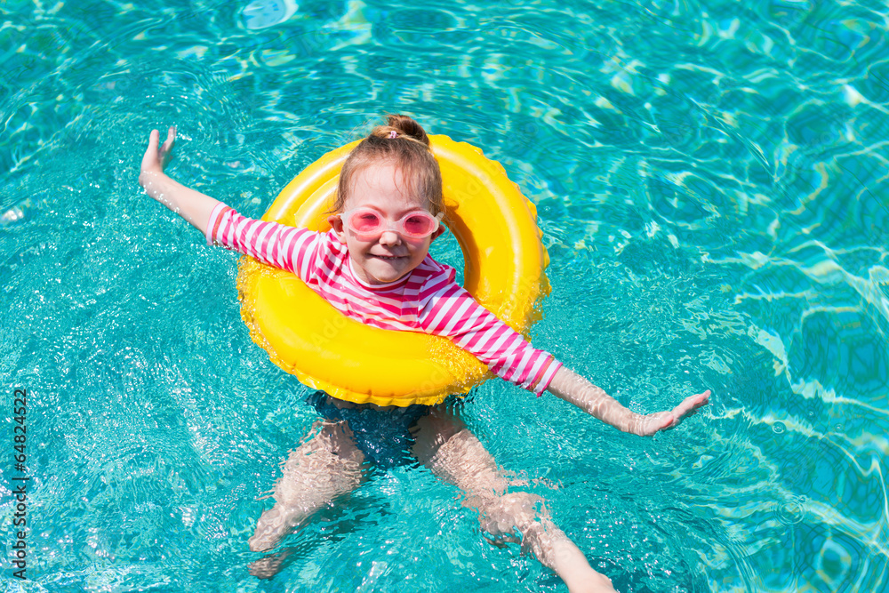Little girl at swimming pool