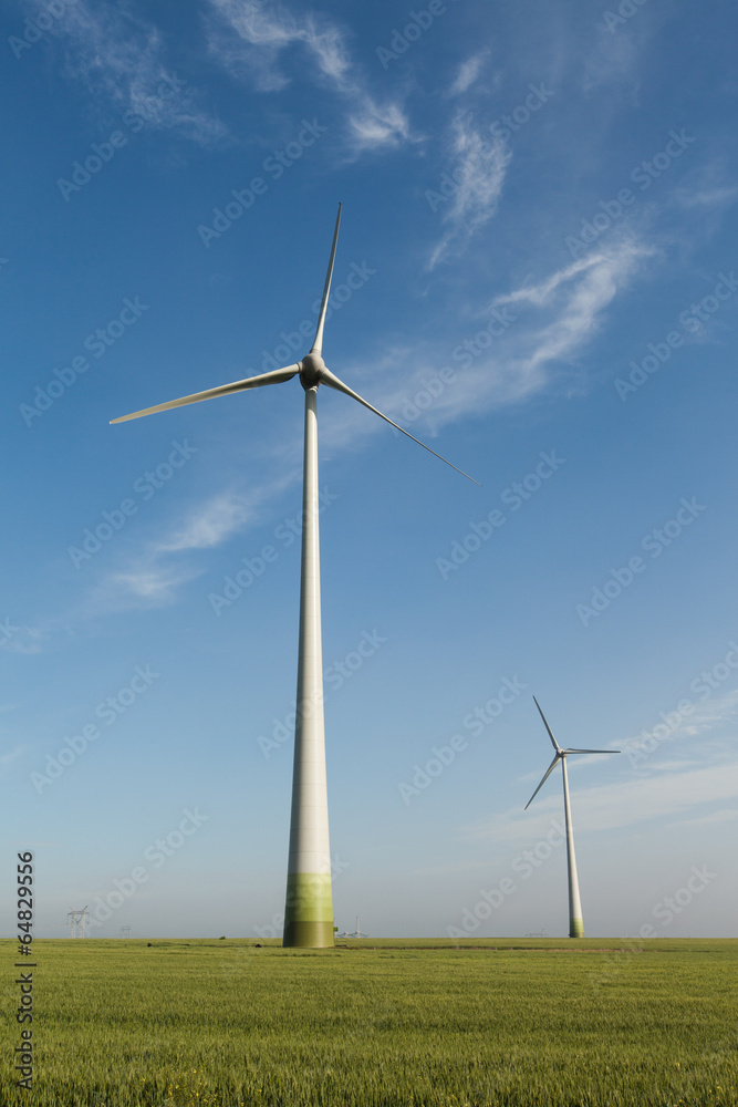 Wind power field with blue sky and white clouds Wind power field with blue sky and white clouds