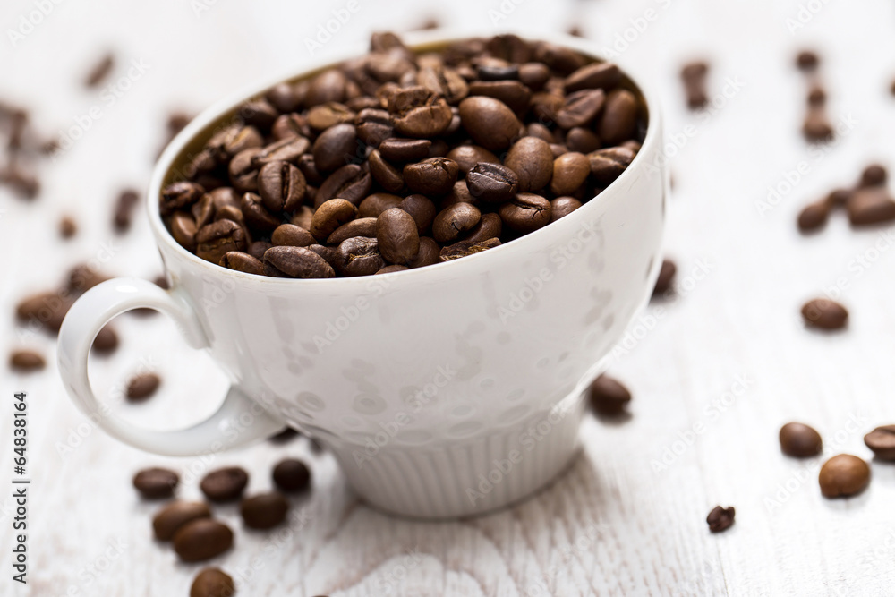 Fototapeta premium Cup and coffee beans