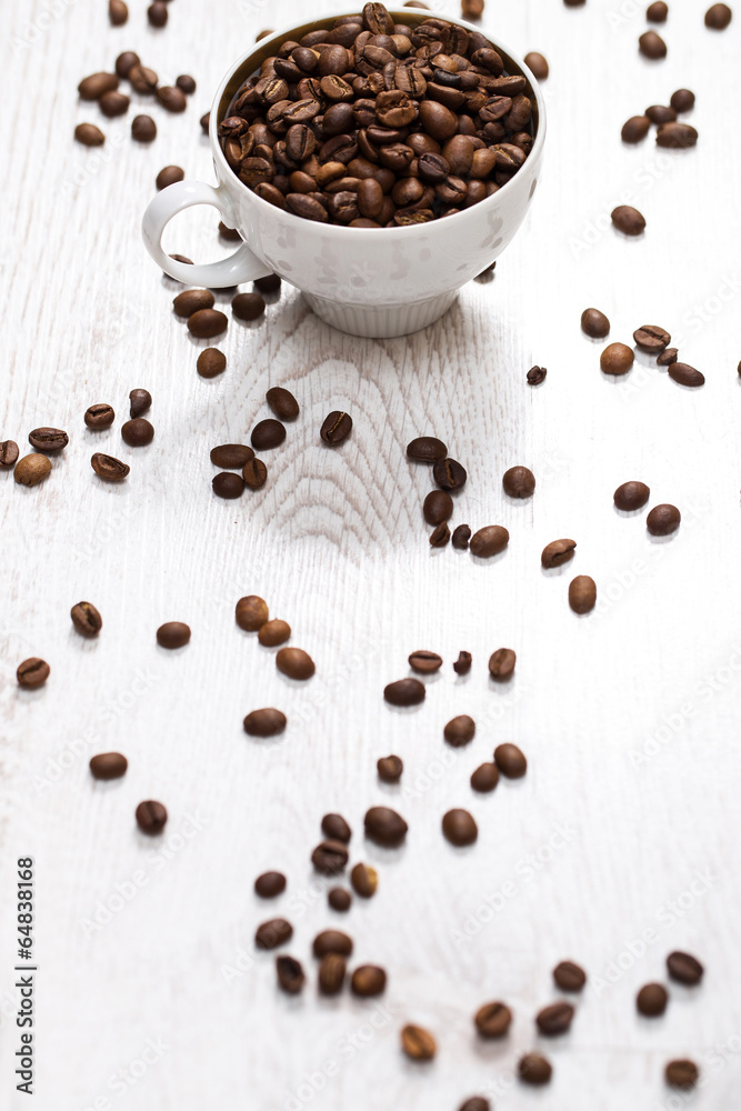 Cup and coffee beans