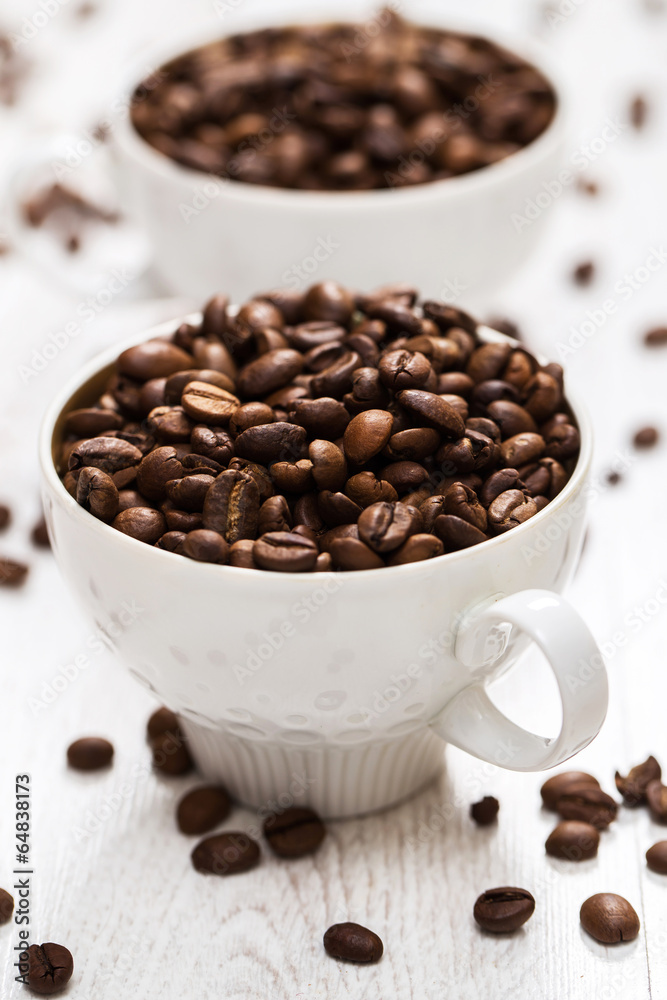 Cup and coffee beans