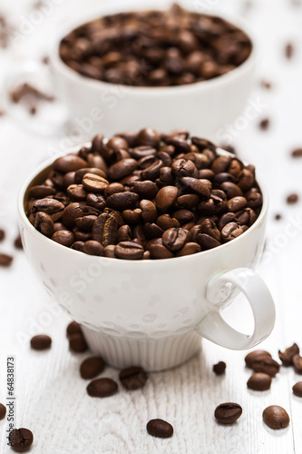Cup and coffee beans
