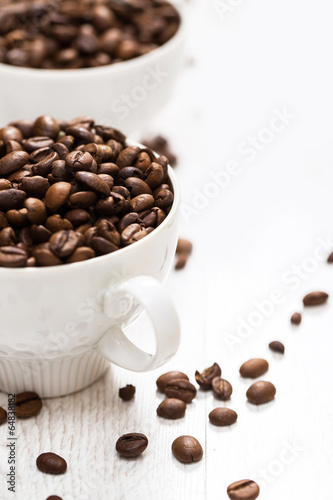 Cup and coffee beans