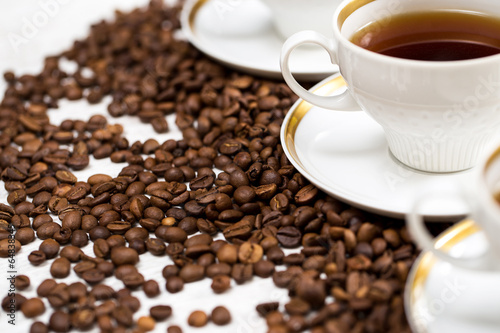 Cup and coffee beans