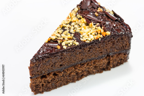 Chocolate cake slice isolated on white plate