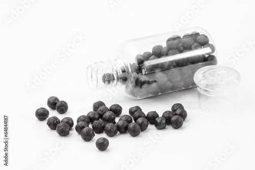 Фотография black bolus isolated on white background