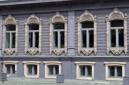 Windows of the house of merchants Chiralov. Architectural monume © strekoza