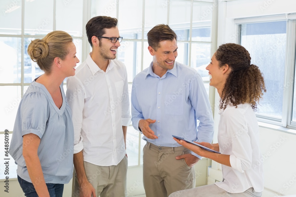 Casual business team smiling and talking Casual business team smiling and talking