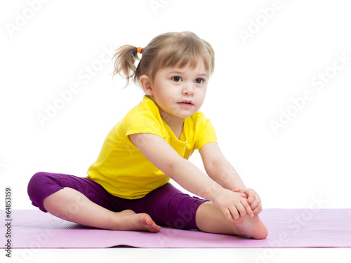 Konstfotografi Kid girl doing fitness exercises