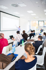 People listening to a presentation