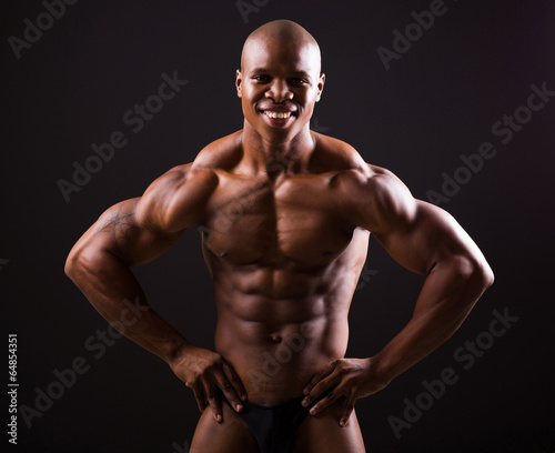 african bodybuilder on black background