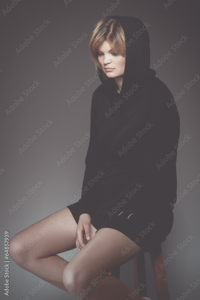 Naklejka premium Young sad woman