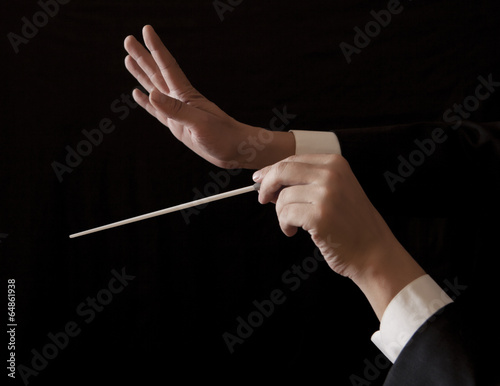 Music male director holding stick