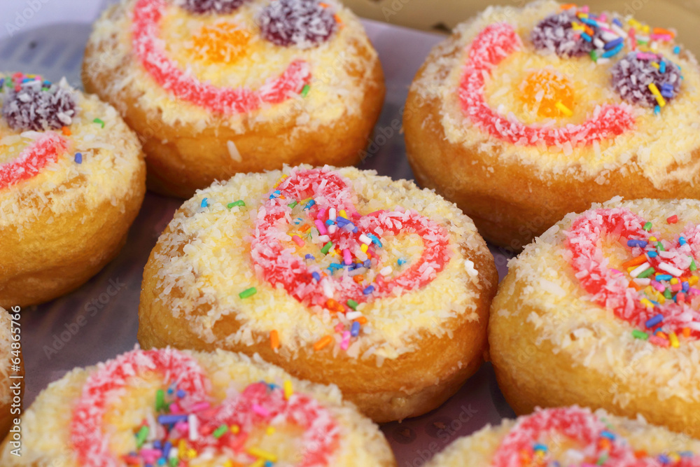 A lot of donuts and strawberry jam A lot of donuts and strawberry jam