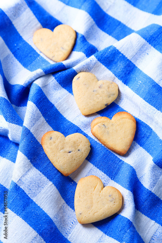 Lavender cookies on color napkin background photo