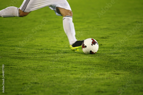 Soccer player and ball © Nebojsa