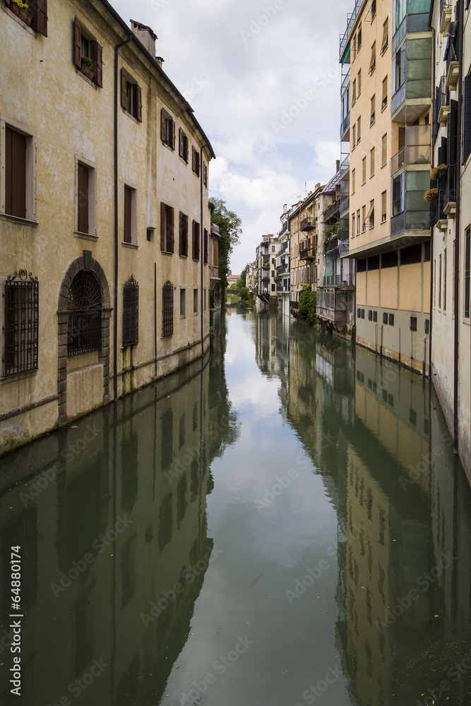 Traditional Buildings on a Canal in an Old Italian Town