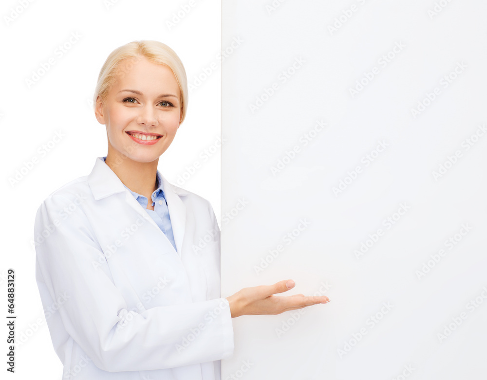smiling female doctor with white blank board smiling female doctor with white blank board