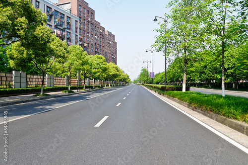 The quiet city suburbs road. © ABCDstock