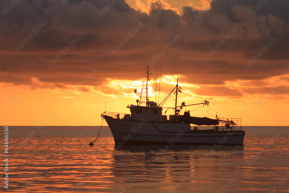 Fishing Boat at Sunset on ocean