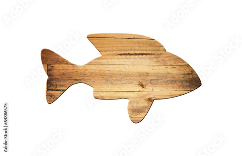 The shape of fish on old wood surface. photo